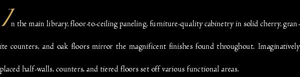 In the main library, floor-to-ceiling paneling, furniture-quali